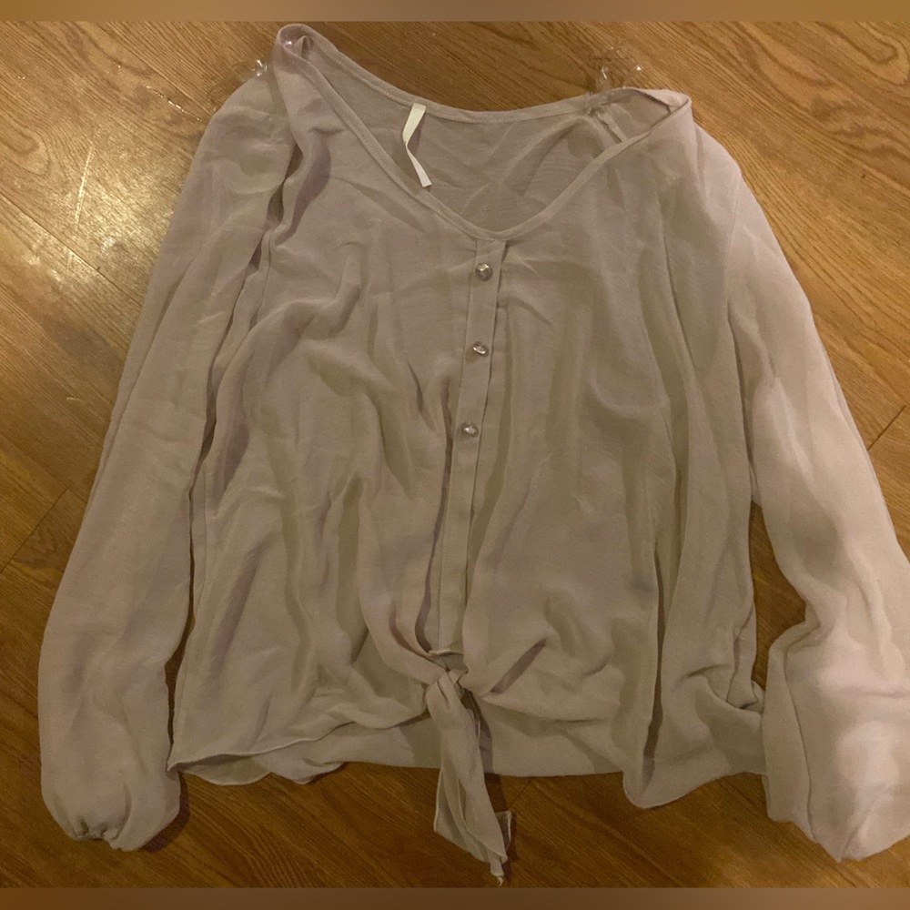 Size medium blouse. Good condition